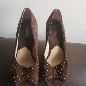 Michael Kors opened to heels